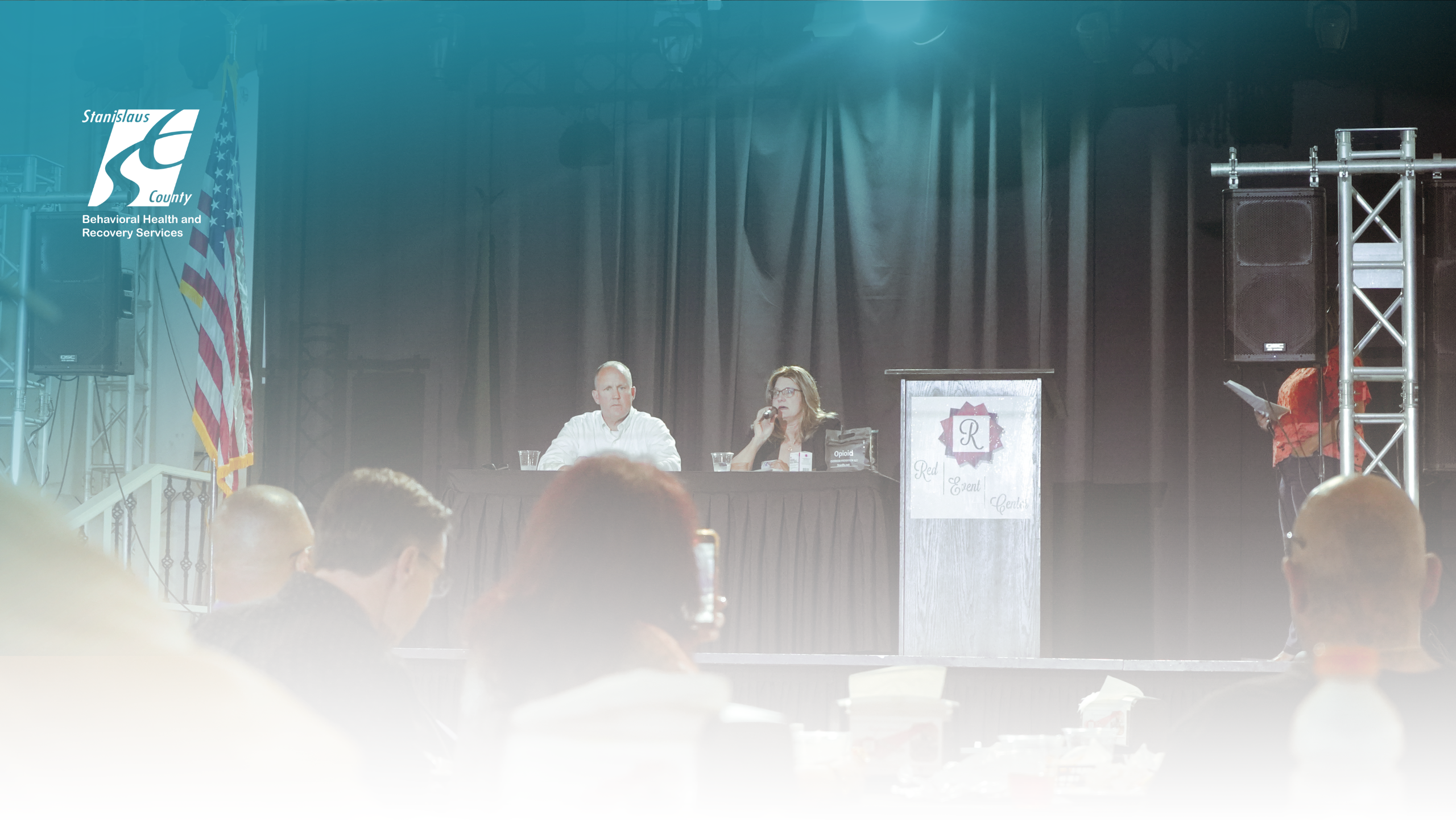 BHRS Prevention Services Coordinator and Stanislaus County Sheriff connecting with community through a panel. 