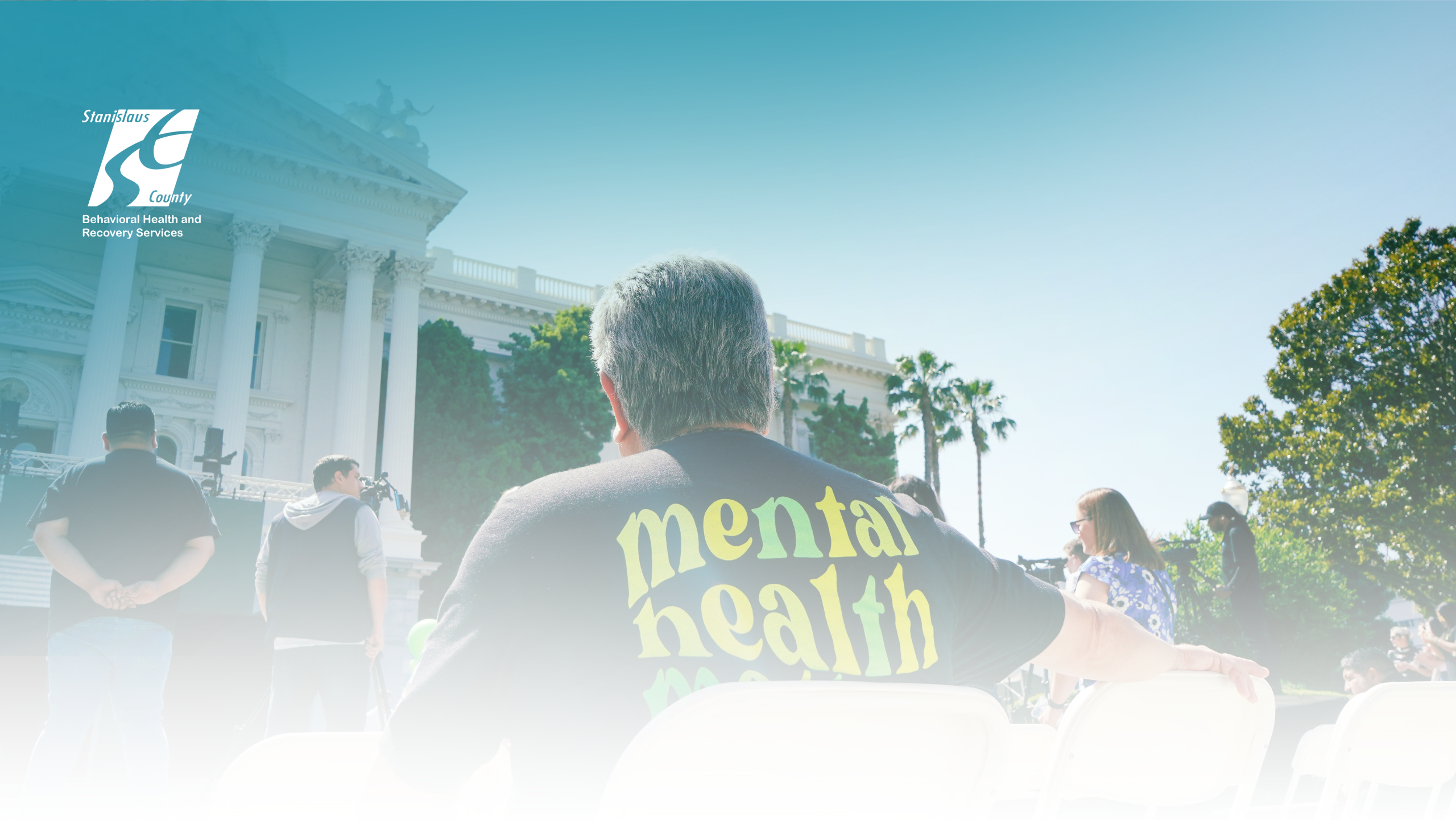 BHRS Prevention Staff at the Annua; Mental Health Day event at the state capitol wearing a shirt that reads “Mental Health Matters.”