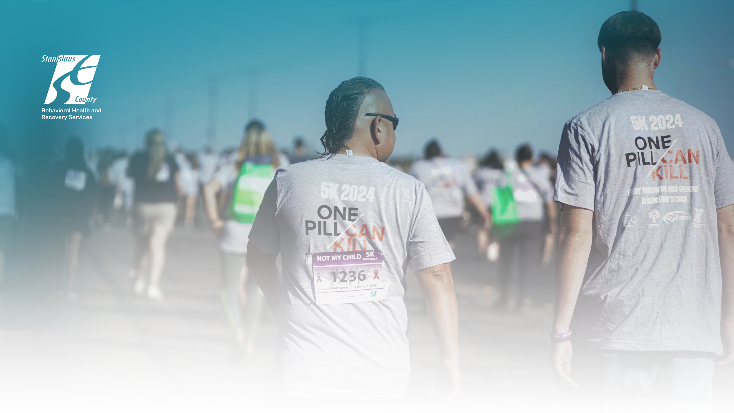 An individual wearing a One Pill Can Kill shirt at the annual Not My Child 5K Fentanyl Awareness Walk/Run.